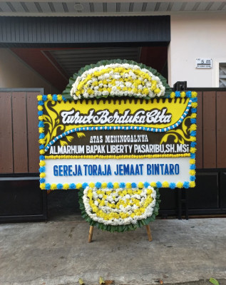 Papan Bunga Duka di Naikolan